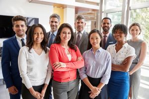 Smiling corporate business team, group portrait